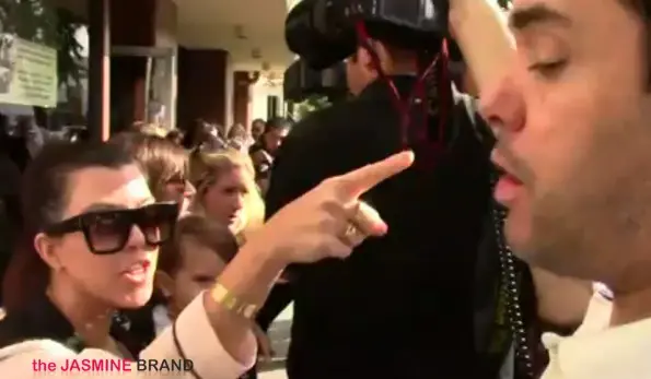 kourtney kardashian-fights with paparazzi-with daughter-the jasmine brand