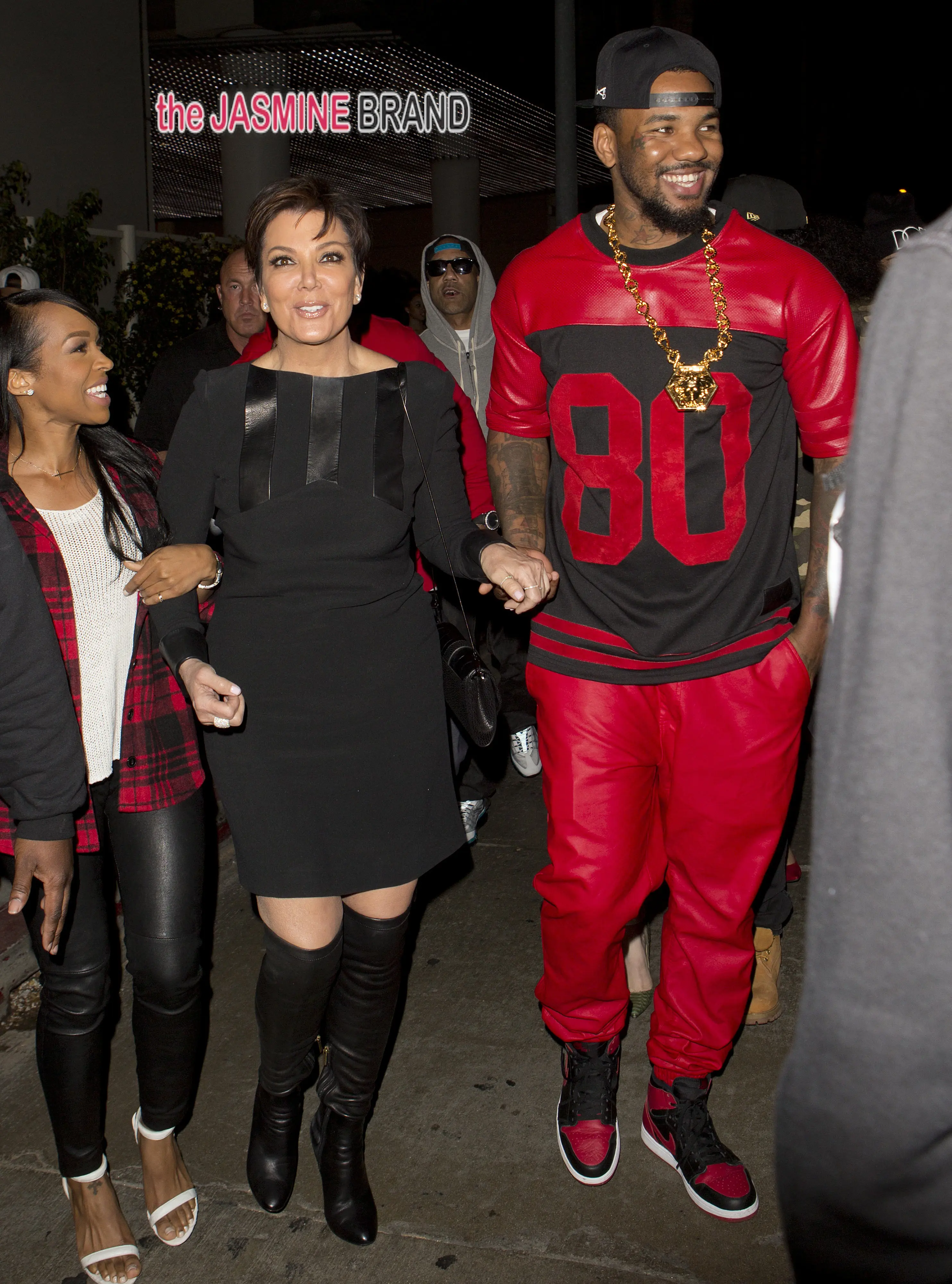 Khloe Kardashian holds hands with rapper The Game as they take mother Kris Jenner to Tru Night club in Hollywood, CA