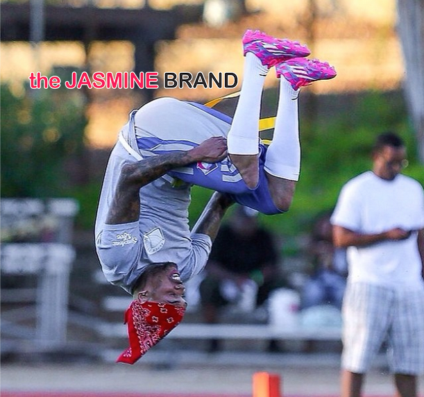 flip-chris brown-quincy-flag football charity game 2014-the jasmine brand