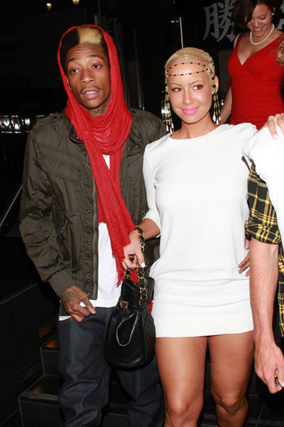 amber rose and wiz khalifa in paris. Everyone is all up in Amber