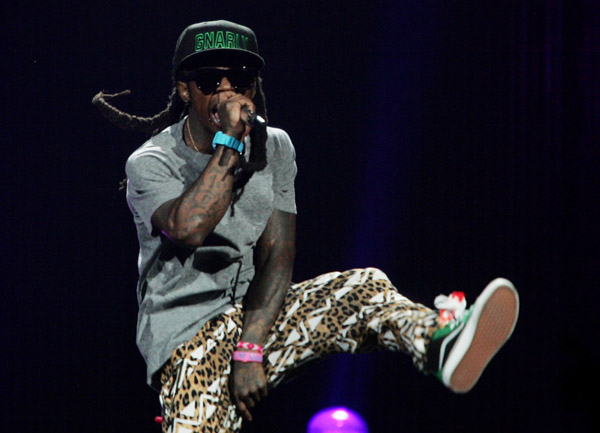 Lil Wayne Brings His Band Aid Skate Board Pajama Pants On Stage