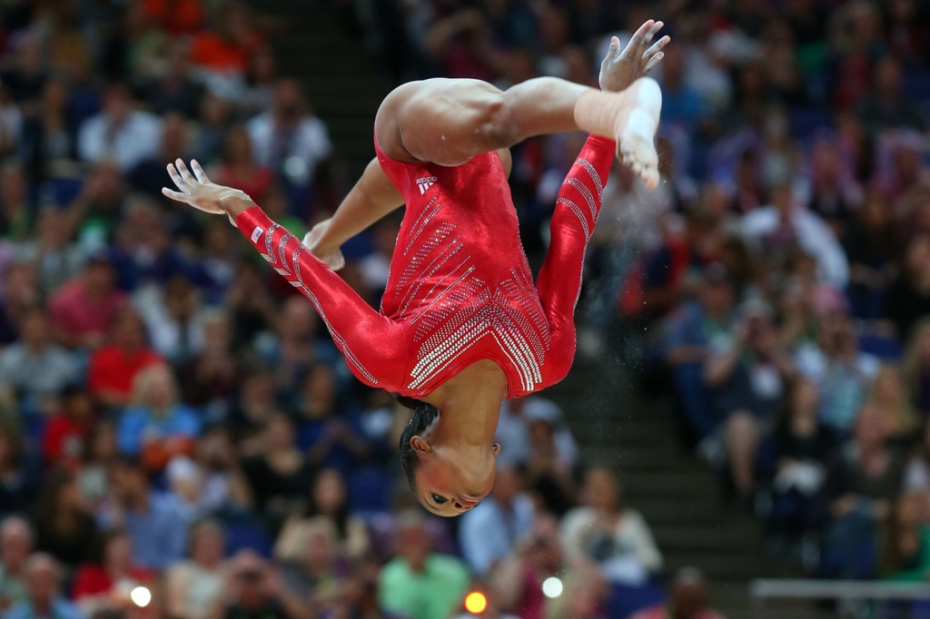 History Maker Gabby Douglas 1st African American To Win Womens All Around Gym Gold 