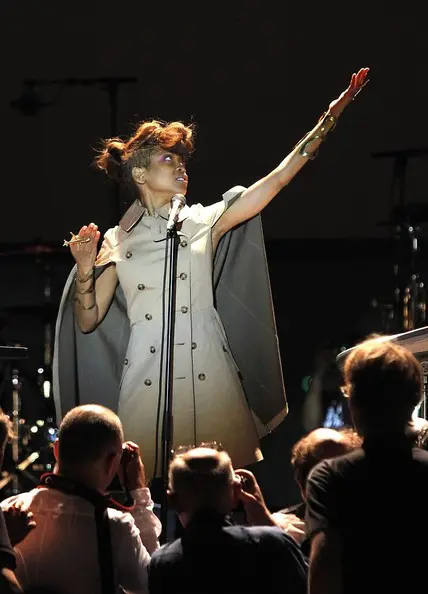 Erykah Badu Rocks Shaved Sides, Messy Bun & Cape for Nice Jazz Festival