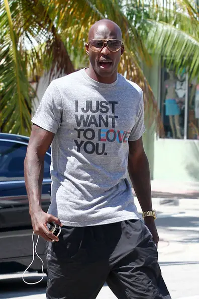 Ochocinco Makes First Public Appearance + Was His T-Shirt for Evelyn Lozada?