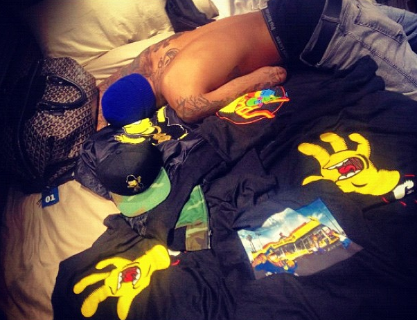 Rihanna Snaps A Photo of Chris Brown Chest-Naked In Bed