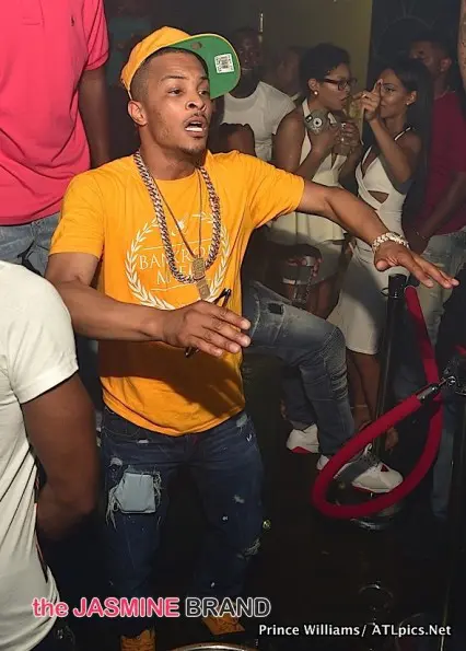 T.I. Flips Out After Male Fan Gras His A$# 