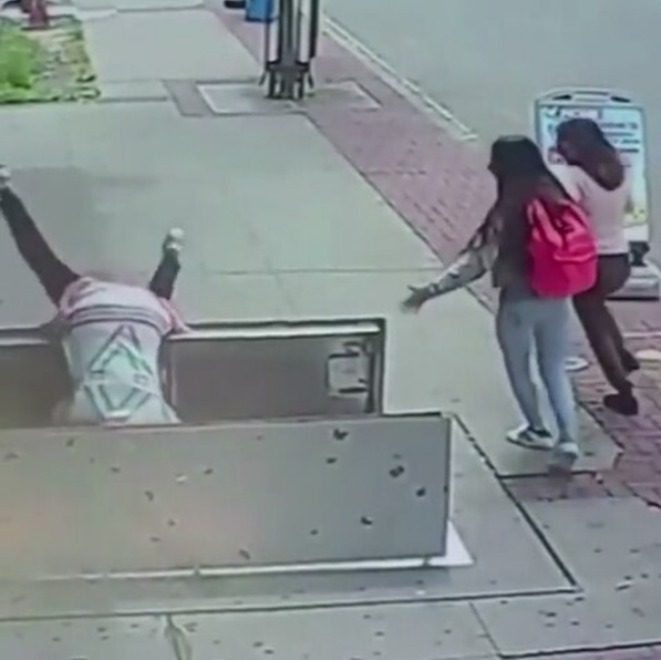 Ouch! Distracted By Her Phone, A Woman Flips Head First Falling 6 Feet [VIDEO]