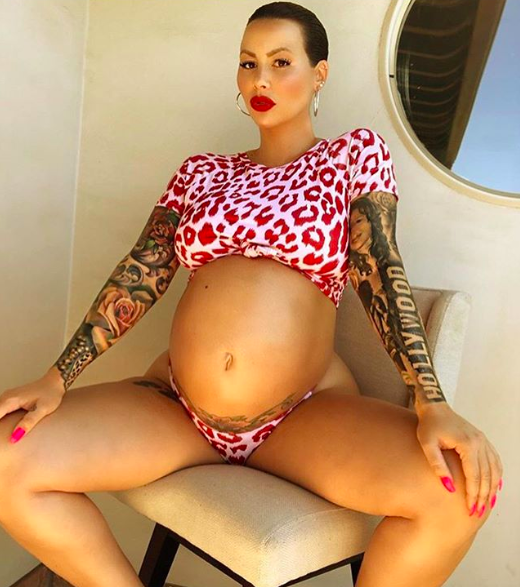 Pregnant Amber Rose Is Bumpin’ Around With Bare Belly In Bikini [Photo]