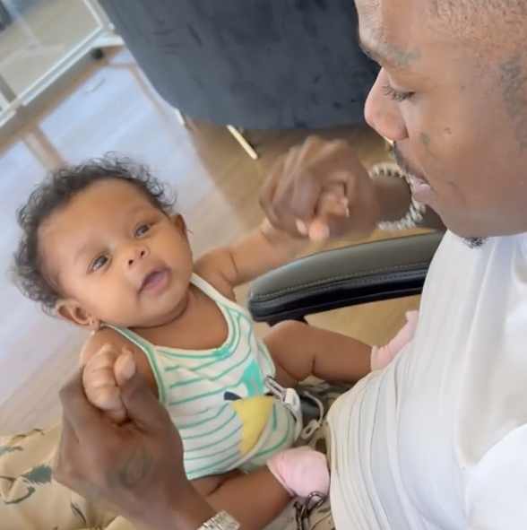 Da Baby Writes Cryptic Post As He Holds Infant Daughter: Can’t Wait To Put Ya Boyfriend On A T-Shirt