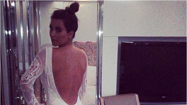 Attention Seeking or Hinting Marriage : Kim Kardashian Tries On Wedding Gown