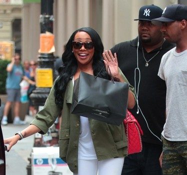 A Casually Dressed Monica Shops In New York