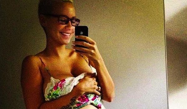 Inappropriate Or Sexy : A Very Pregnant Amber Rose Unveils Belly & Lingerie