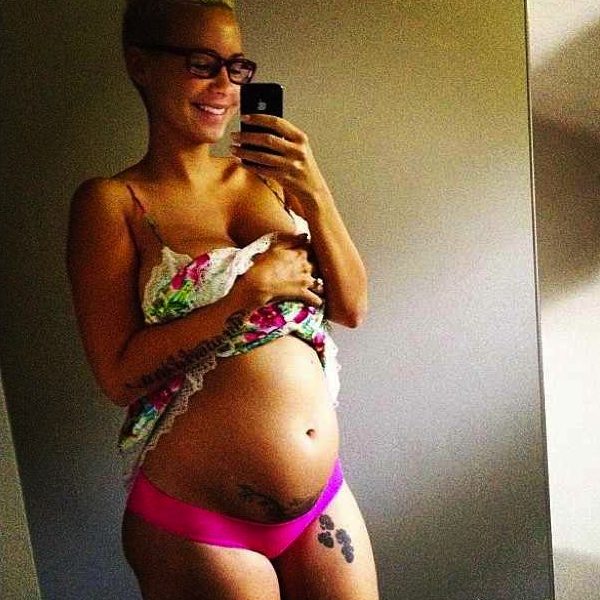 Inappropriate Or Sexy : A Very Pregnant Amber Rose Unveils Belly & Lingerie