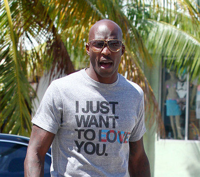 Ochocinco Makes First Public Appearance + Was His T-Shirt for Evelyn Lozada?