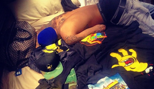 Rihanna Snaps A Photo of Chris Brown Chest-Naked In Bed