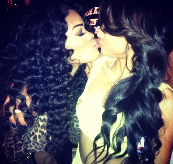 [Photos] Karrueche Tran Kisses Teyana Taylor At Midnight, Instead of Chris Brown