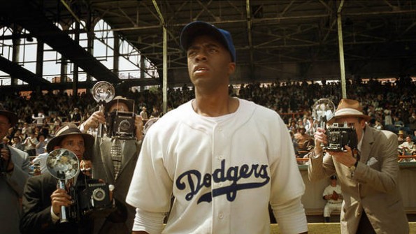 Actor Chadwick Boseman portrays legenday baseball player Jackie Robinson in the new Warner Bros. film "42' in this undated publicity photograph