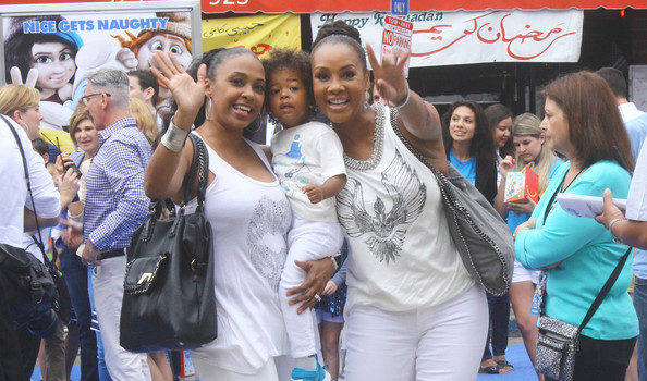 Vivica Fox Hits Smurfs Premiere, Ty Hunter Backstage + Miley Cyrus Strips For Sun Cancer