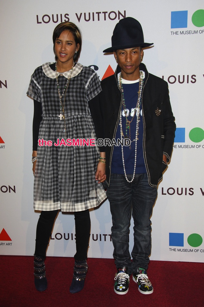 Pharrell Williams and Helen Lasichanh arriving to the Chanel show