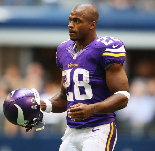 NFL’er Adrian Peterson Barred From Vikings Until Child-Abuse Resolved