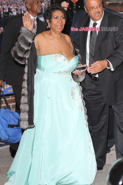 Aretha Franklin waves as she steps out of the 'Late Show with David Letterman' where she performed