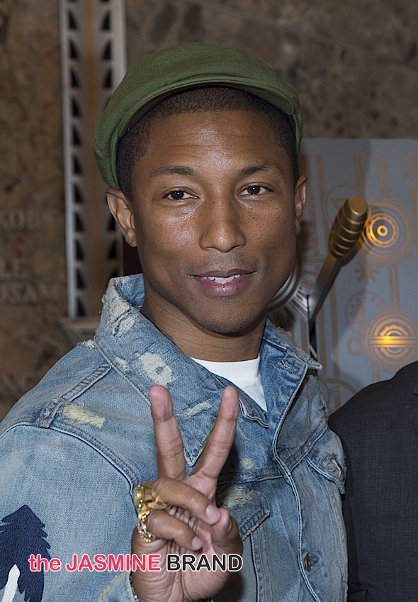 Pharrell Williams Lights the Empire State Building in Yellow for UN International Day of Happiness in New York City on March 20, 2015