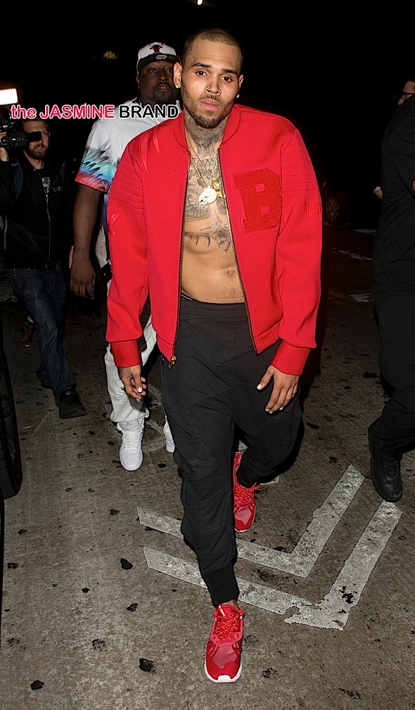 Chris Brown shirtless with just an open jacket seen leaving 'Argyle' Night Club in Hollywood, CA