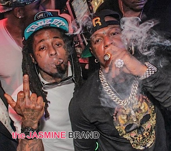 Did Birdman Hurl A Drink At Lil Wayne On Stage? [VIDEO]