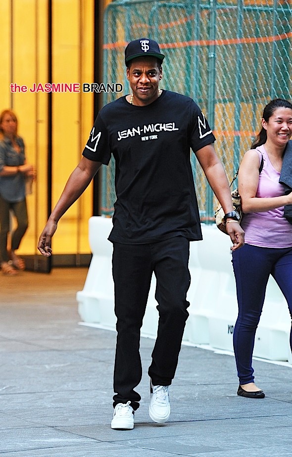 Jay-Z is seen leaving his Broadway office in a good mood before heading home in NYC