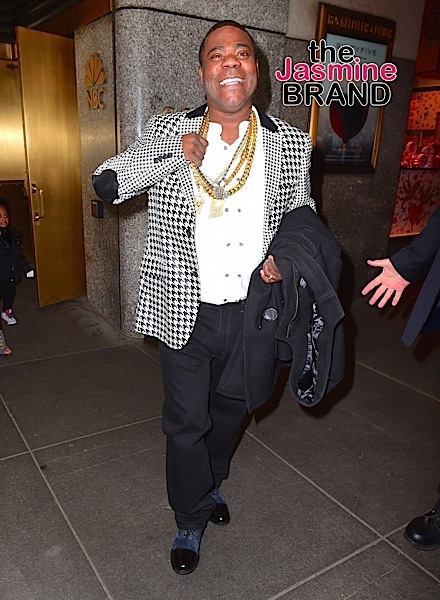 Tracy Morgan shows off his huge gold chains as he leaves the 'Tonight Show' with his family