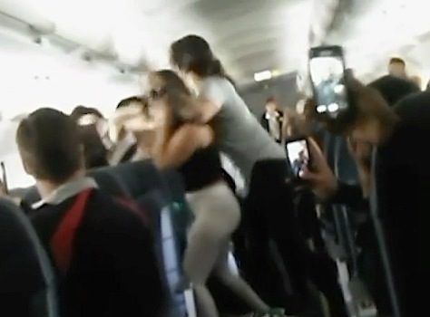 Hair Pulling Brawl Breaks Out On Flight Over Boombox [VIDEO]