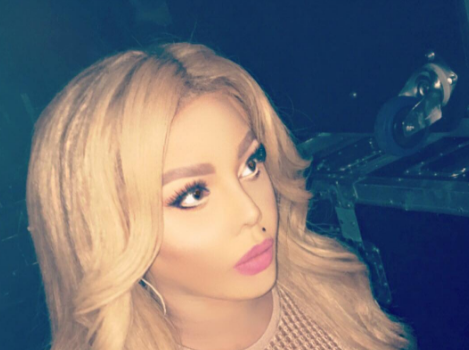 Lil Kim Drags Fan For Skin Bleaching Accusations: You miserable moron!