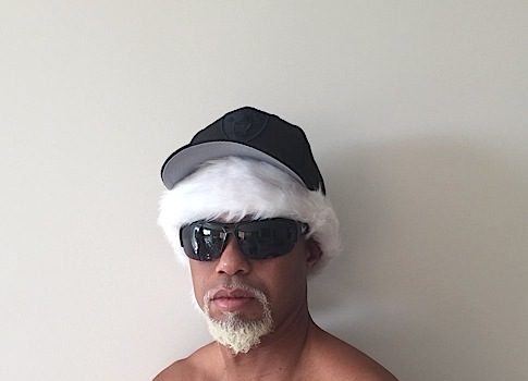 A Chest Naked Tiger Woods Introduces Mac Daddy Santa [Photo]