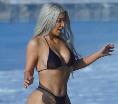 Kim Kardashian Wears String Bikini In Malibu + “Keeping Up With the Kardashian’s” Teaser