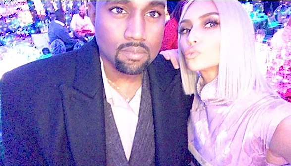 Kanye West Gifts Kim Kardashian w/ Hundreds of Thousands Of Dollars Worth of Stock [VIDEO]