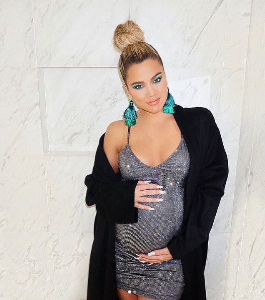 Khloe Kardashian: Stop Criticizing Me For Holding My Baby Bump!