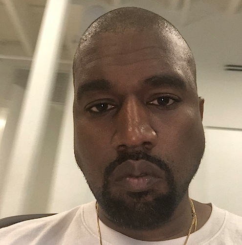 Kanye West & His Father Eat Bugs To Celebrate Beating Cancer [Photo]