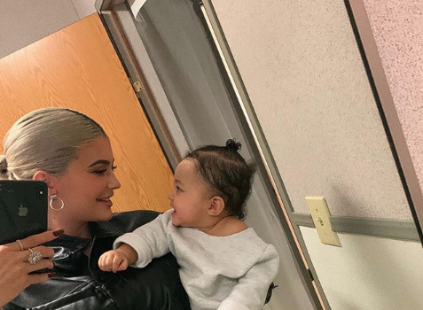 Kylie Jenner Tries To Get Baby Stormi To Promote Cosmetics Line [VIDEO]