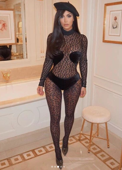 Kim Kardashian Stuns In Sheer Lace Bodysuit At Paris Fashion Week [Photos]