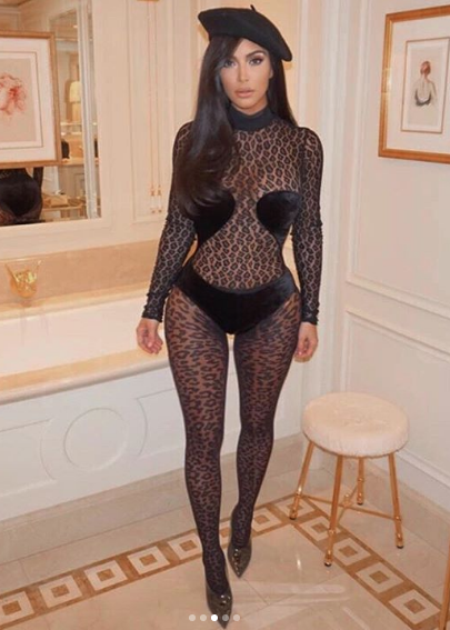 Kim Kardashian Stuns In Sheer Lace Bodysuit At Paris Fashion Week