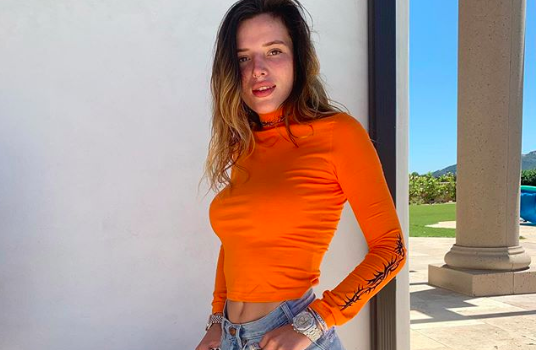 Bella Thorne Recalls Almost Being ‘Fired Off The Disney Channel’ At 14 For Wearing a Bikini ‘On The Beach’