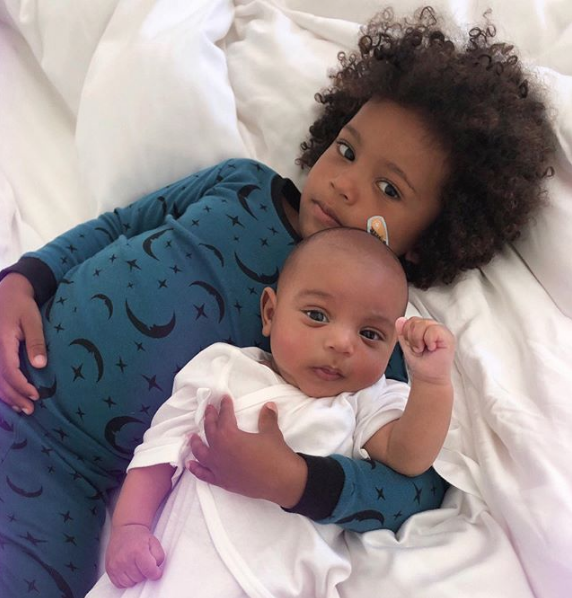 Kim Kardashian’s Oldest Son Saint Sweetly Holds Baby Brother Psalm, As He Asks Mom To Take A Photo  
