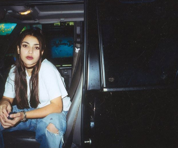A Teenage Kim Kardashian Wears Chokers, Dark Lipstick & Baggy Jeans