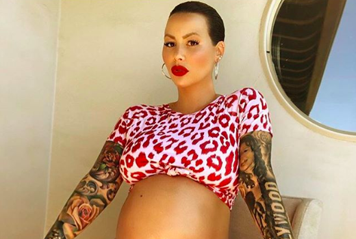 Pregnant Amber Rose Is Bumpin’ Around With Bare Belly In Bikini [Photo]