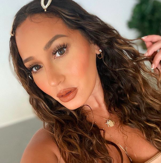 Adrienne Bailon Shows Off 20-Pound Weight Loss In Bikini: I’m On A Plant-Based Diet & Changed My Relationship w/ Food
