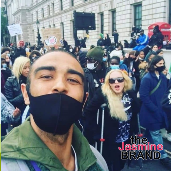 Madonna Protests W/ Crutches In London