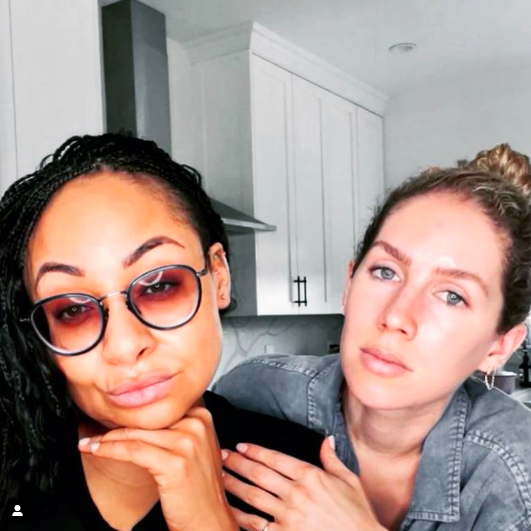 Raven Symone Reveals She Previously Broke Up W/ Her Now Wife After ‘Thinking That The Black Community Would Be Mad I Was Dating A White Person’