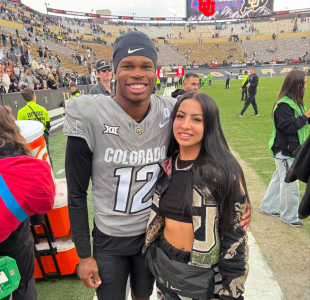 College Football Star Travis Hunter Defends His Fiancèe Against Backlash After She Seemingly Got An Attitude While He Took Pics w/ Fans