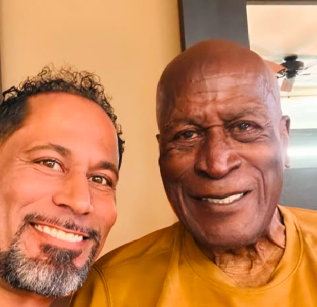 John Amos’ Son K.C. Fires Back At His Sister For Hiring A Lawyer To Investigate The Actor’s De@th: ‘He Passed Of Natural Causes’